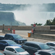Travelers wait to cross into Canada at the Rainbow Bridge in Niagara Falls, Ontario, August 9, 2021 as Canada reopened for nonessential travel to fully vaccinated Americans.